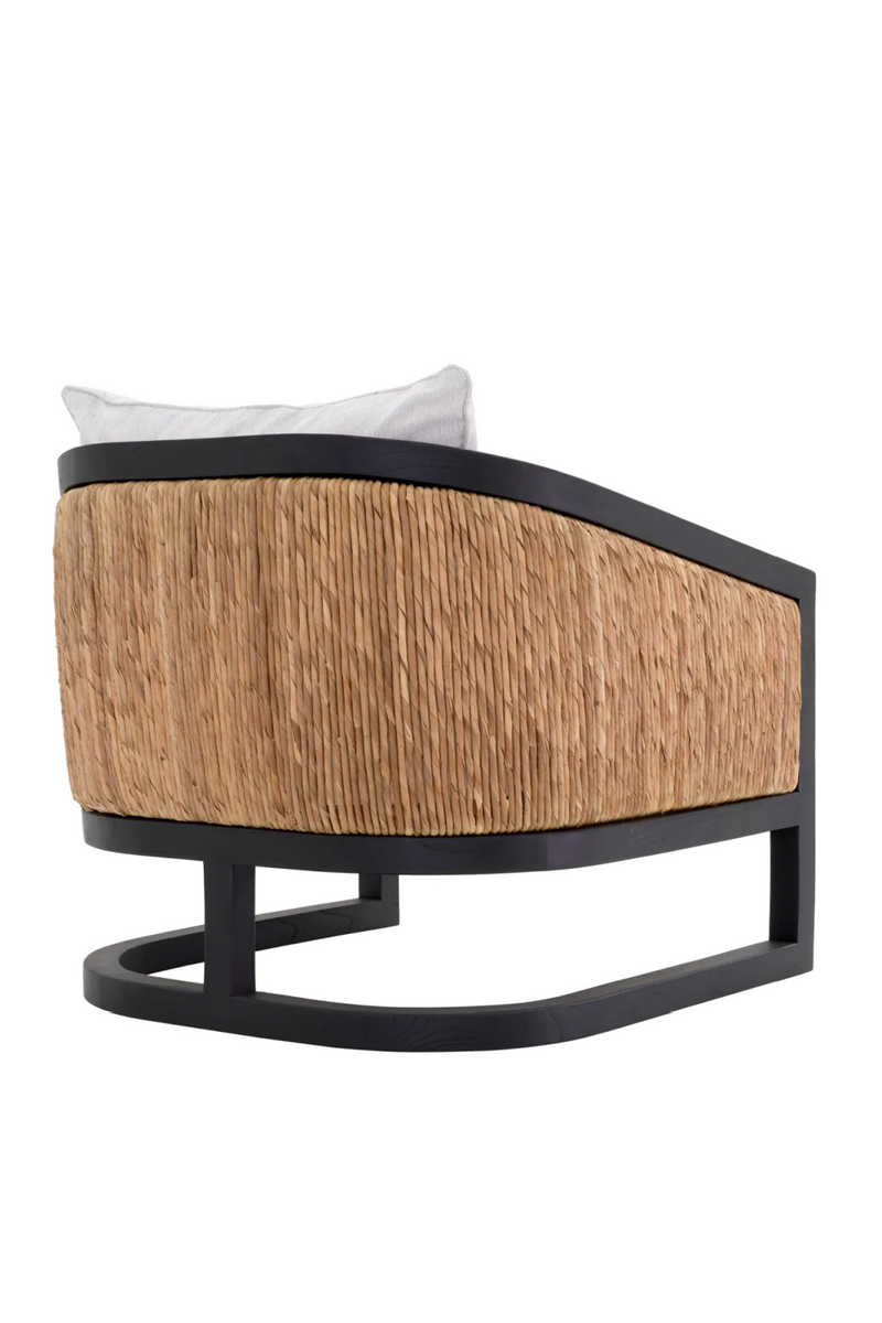 Fauteuil crème en bois noir et rotin | Eichholtz Aruba | Meubleluxe.fr