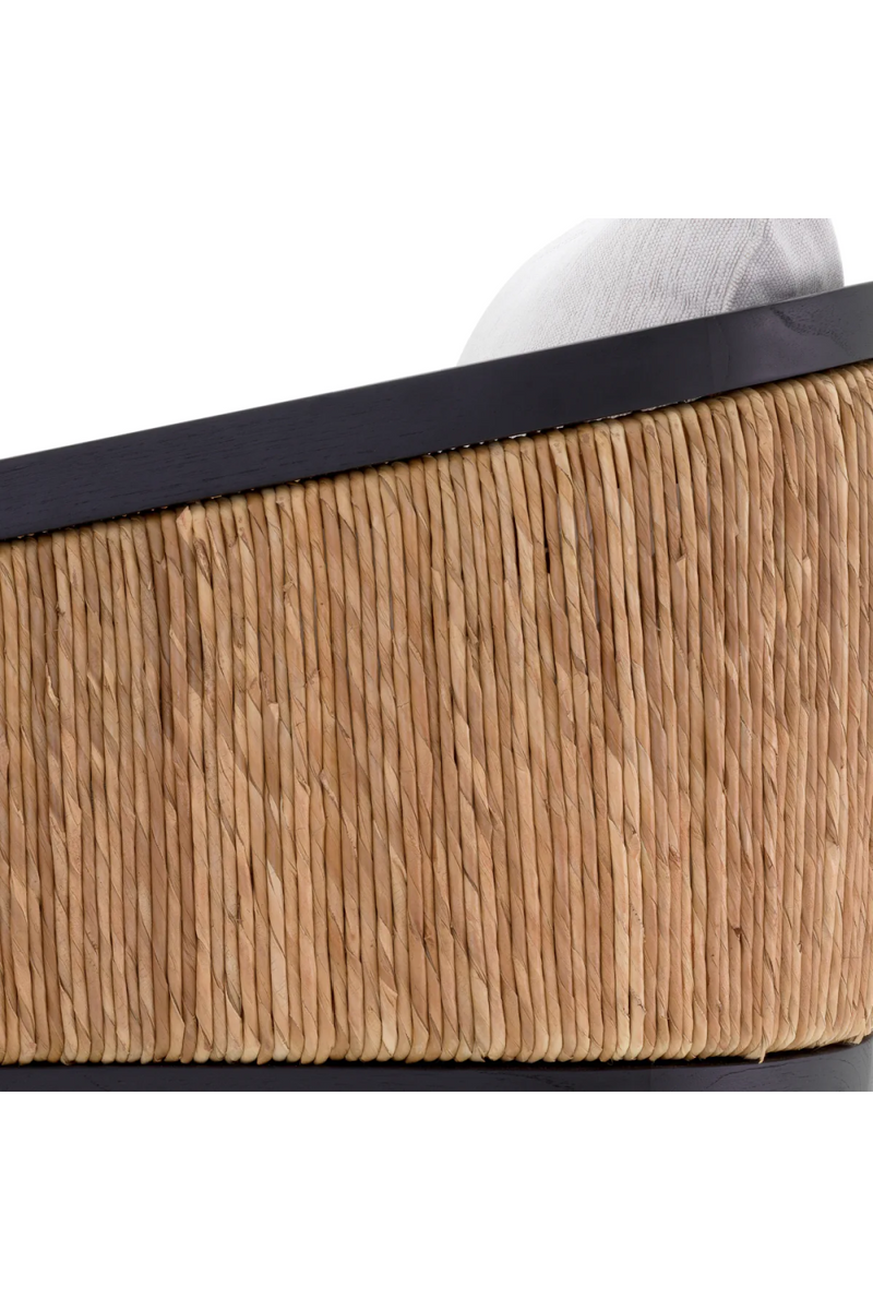 Fauteuil crème en bois noir et rotin | Eichholtz Aruba | Meubleluxe.fr