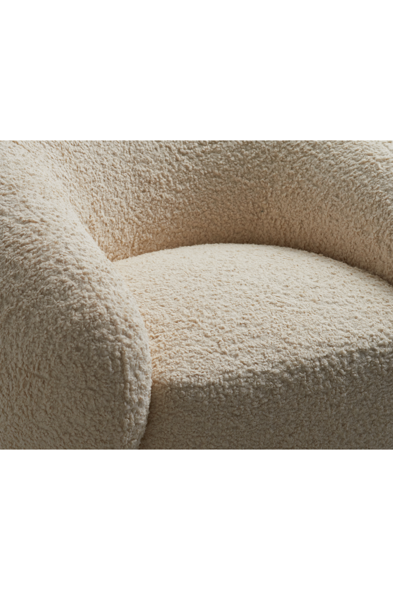 Fauteuil bouclé crème | Andrew Martin Karma | Meubleluxe.fr