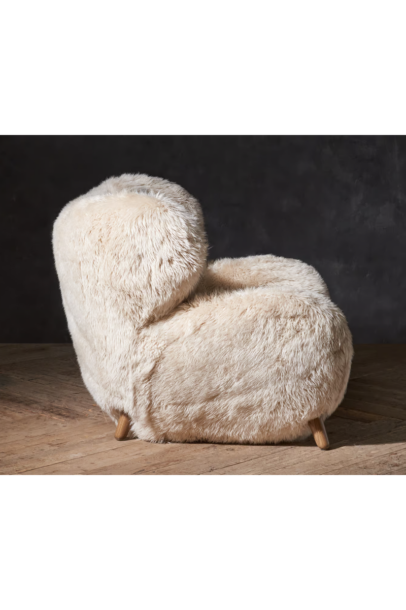 Real sheepskin armchair | Andrew Martin