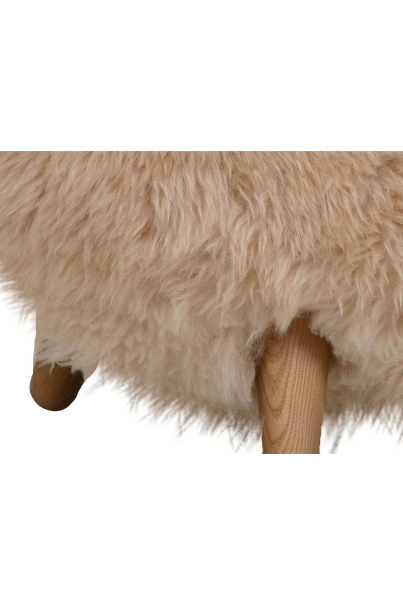 Real sheepskin armchair | Andrew Martin