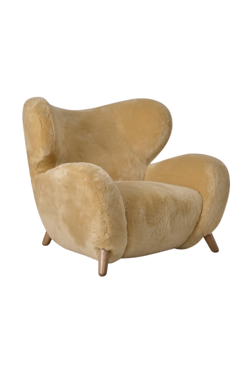 Real sheepskin armchair | Andrew Martin