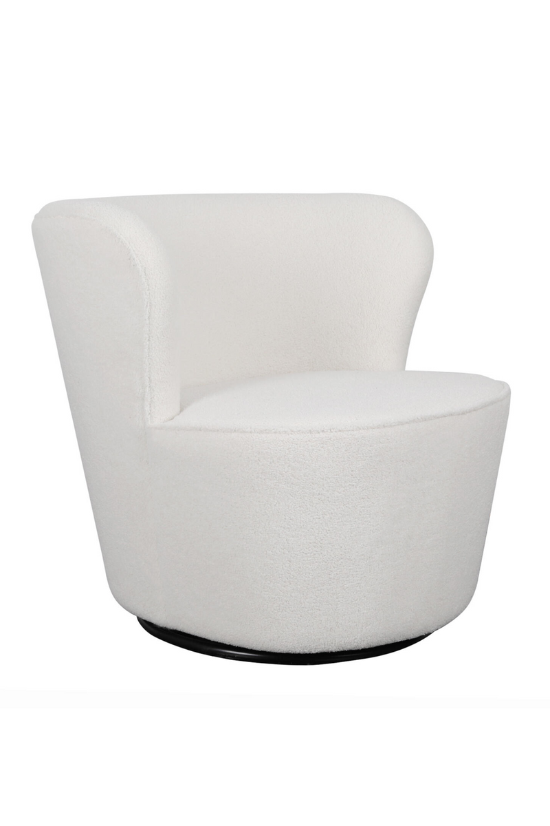 Fauteuil pivotante molletonné crème | Andrew Martin Dorothy | Meubleluxe.fr