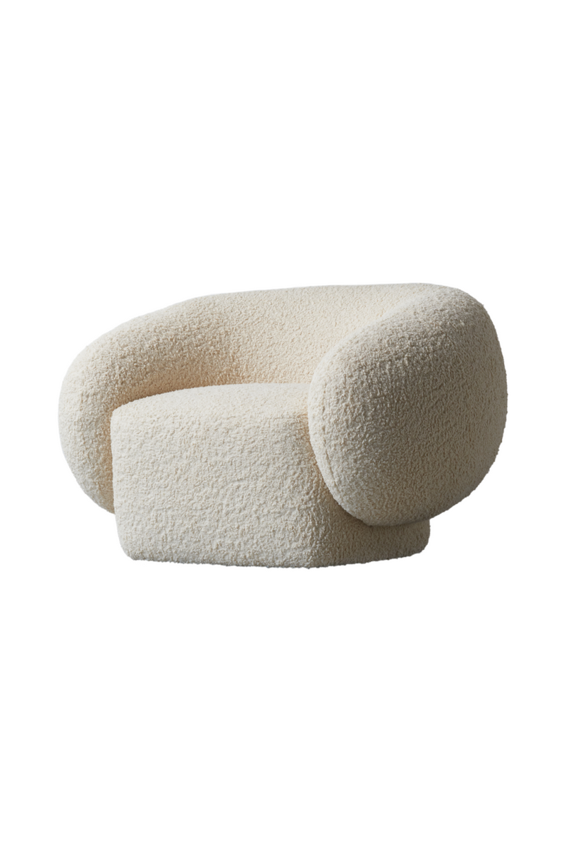 Fauteuil bouclé crème | Andrew Martin Karma | Meubleluxe.fr