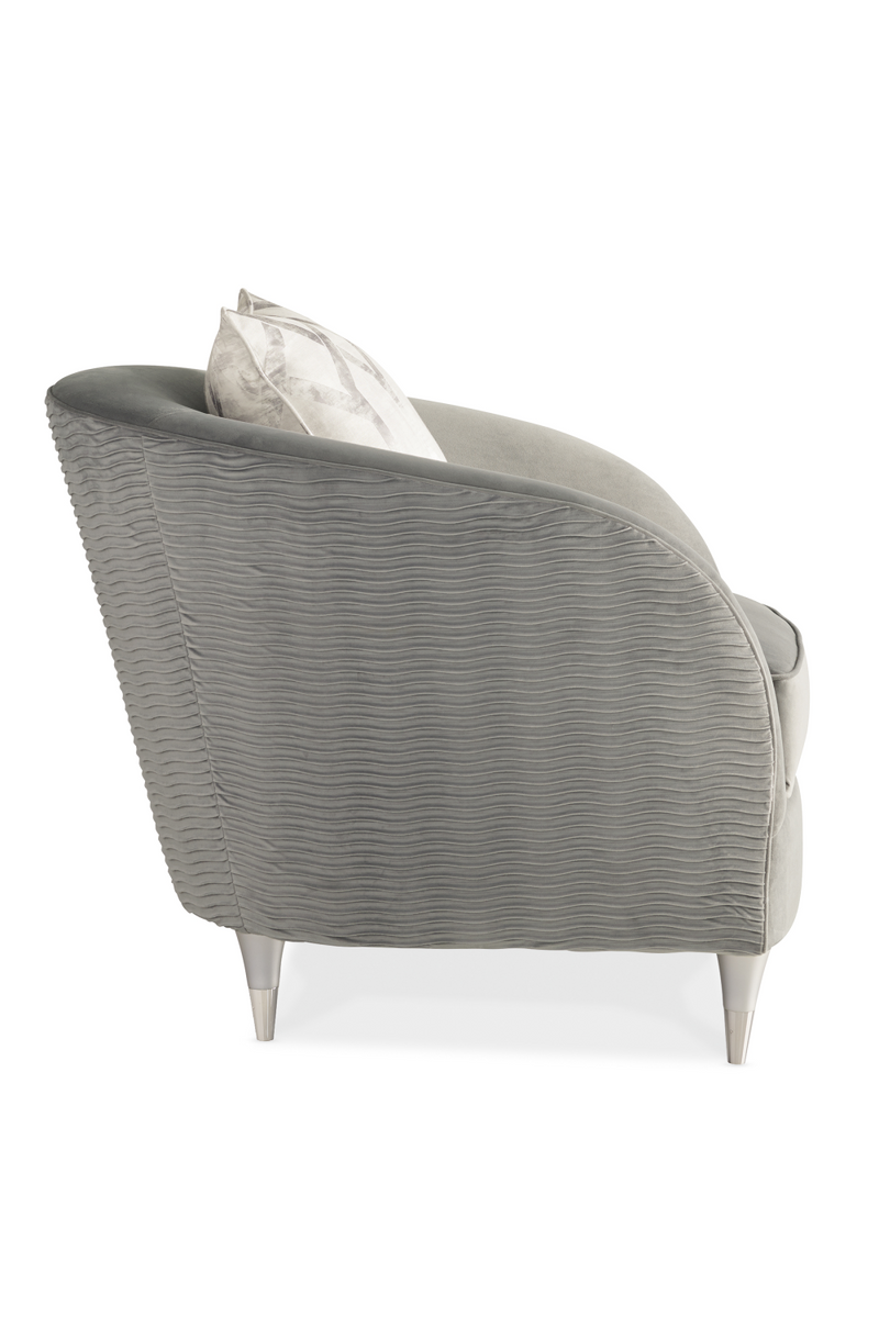 Fauteuil lounge à dossier arrondi gris | Caracole Farrah | Meubleluxe.fr