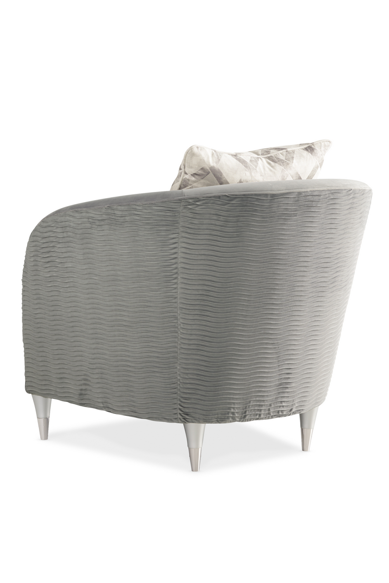 Fauteuil lounge à dossier arrondi gris | Caracole Farrah | Meubleluxe.fr