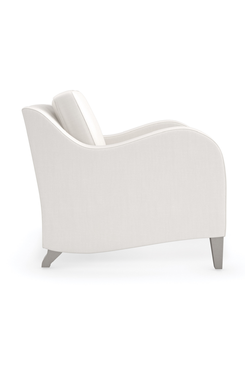 Fauteuil lounge à accoudoirs inclinés | Caracole Victoria | OROA.fr
