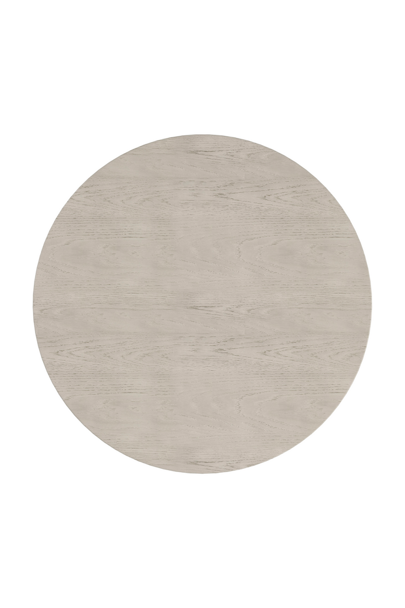 Table de salle à manger ronde en bois chêne taupe | Caracole Pearl | Meubleluxe.fr