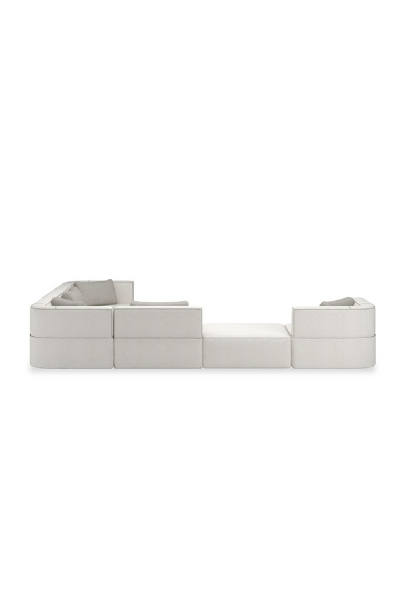 Canapé sectionnel à passepoil blanc | Caracole Marbella