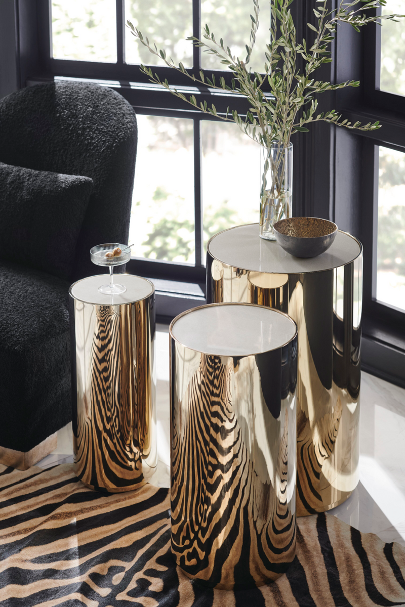 Table basse en métal doré et pierre crème | Caracole Round About L | Meubleluxe.fr