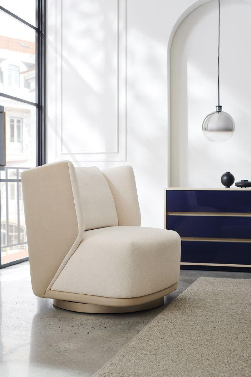 Fauteuil pivotante en bouclé crème | Caracole Seville | Meubleluxe.fr