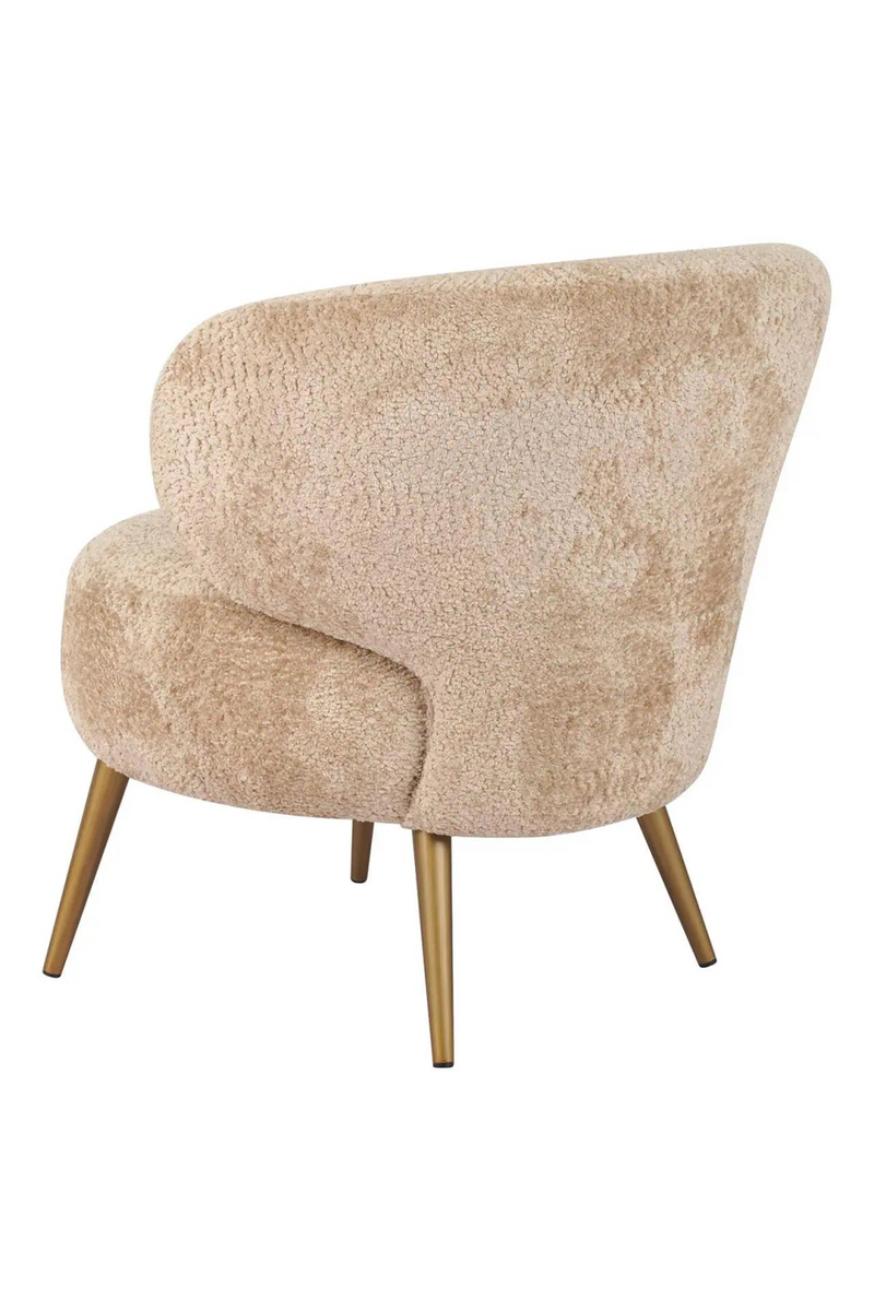 Fauteuil incurvé en tissu marron | Richmond Sabor | Meubleluxe.fr