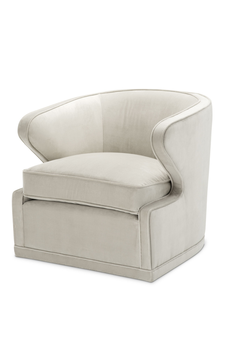 Fauteuil pivotant en velours beige | Eichholtz Dorset | Meubleluxe.fr