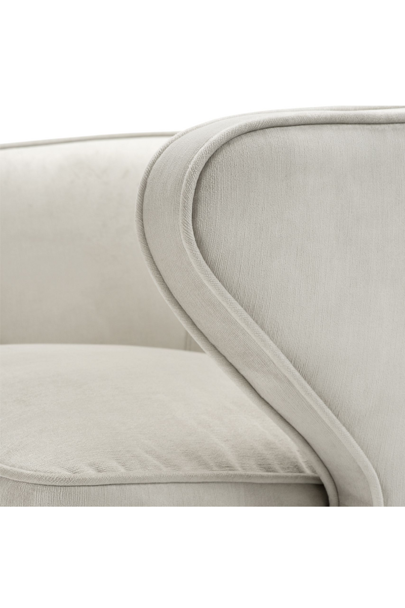 Fauteuil pivotant en velours beige | Eichholtz Dorset | Meubleluxe.fr