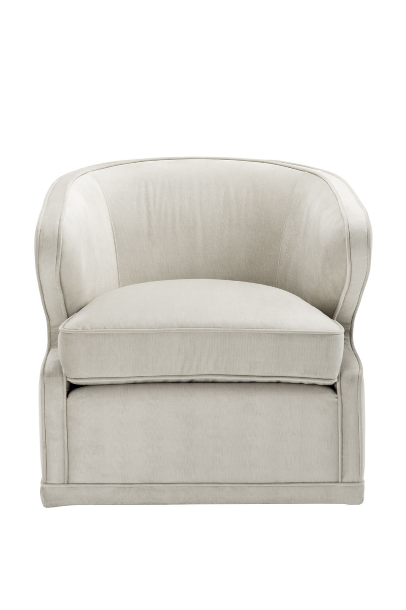 Fauteuil pivotant en velours beige | Eichholtz Dorset | Meubleluxe.fr