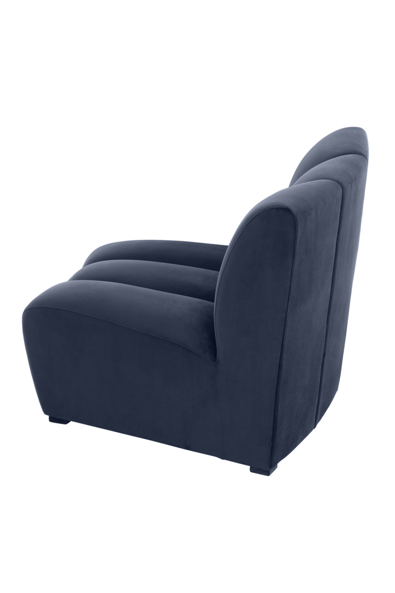 Fauteuil bleu incurvé | Eichholtz Lando | Meubleluxe.fr