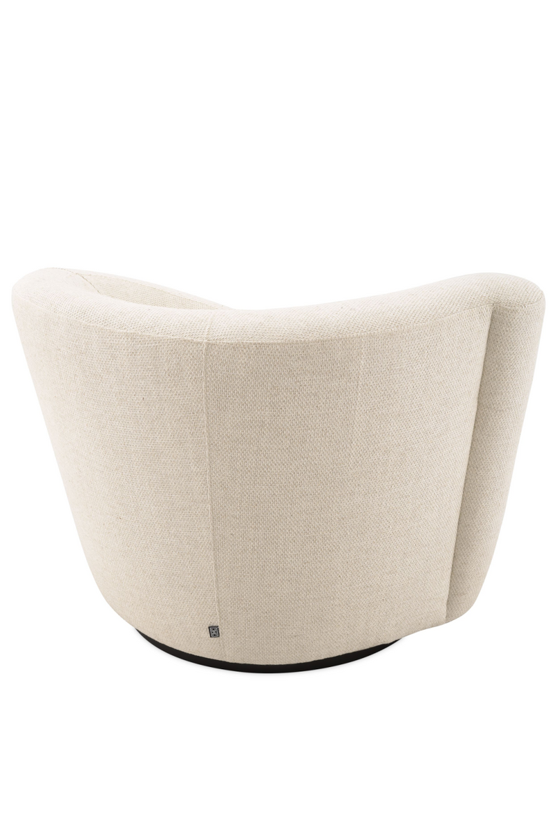 Fauteuil pivotant en pausa naturel (gauche) | Eichholtz Colin | Meubleluxe.fr