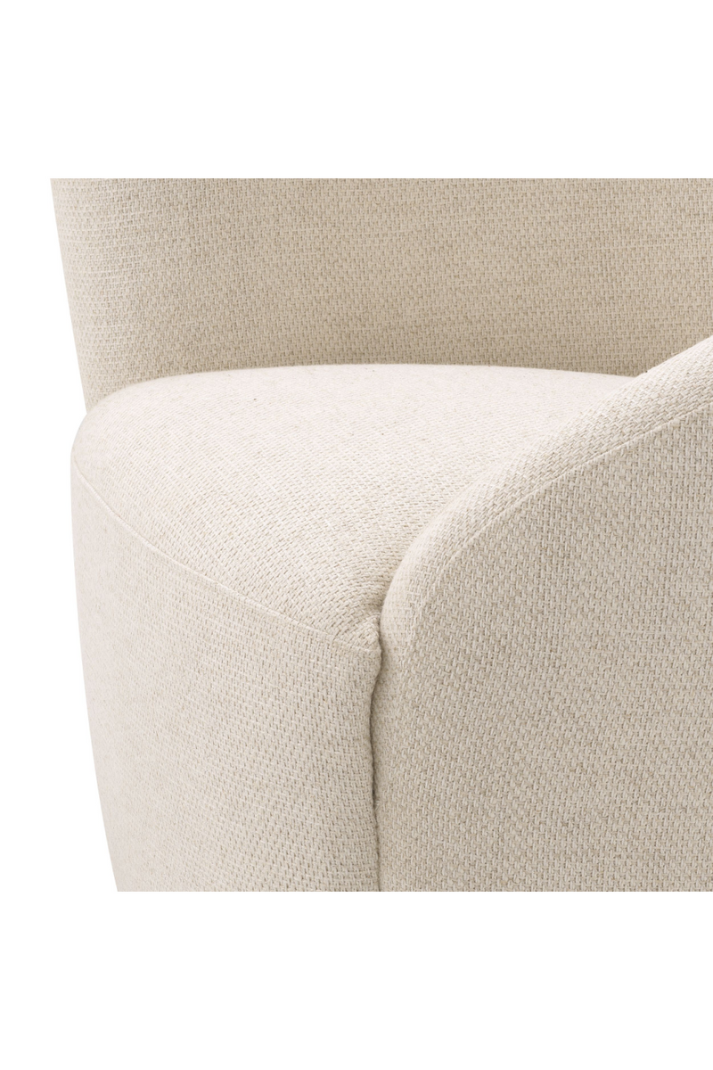 Fauteuil pivotant en pausa naturel (gauche) | Eichholtz Colin | Meubleluxe.fr