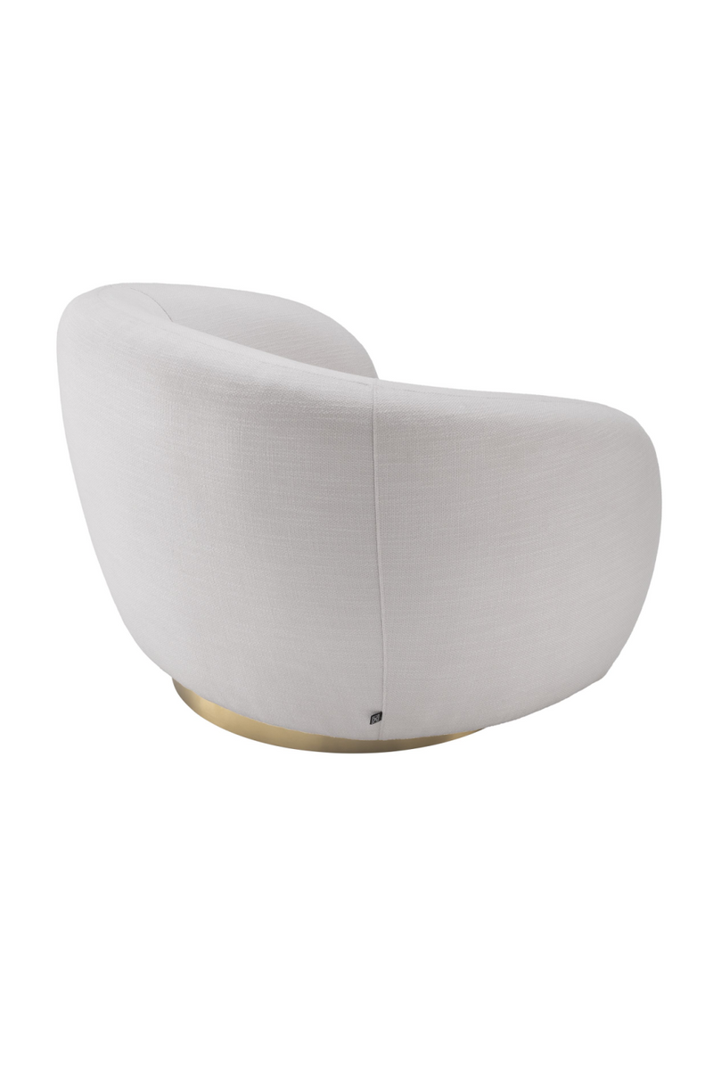 Fauteuil pivotant en tissu blanc | Eichholtz Brice | Meubleluxe.fr