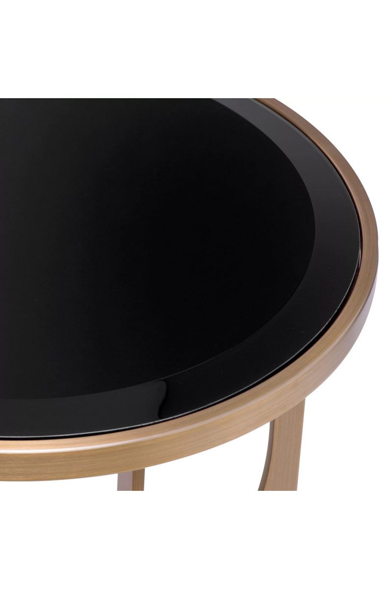 Table d'appoint en laiton brossé et verre noir | Eichholtz Elegance | Meubleluxe.fr