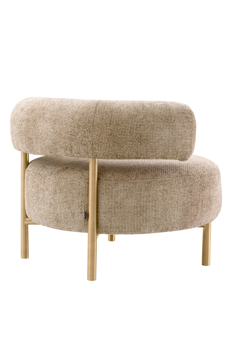 Fauteuil Lyssa sable et laiton brossé | Eichholtz Thompson | Meubleluxe.fr