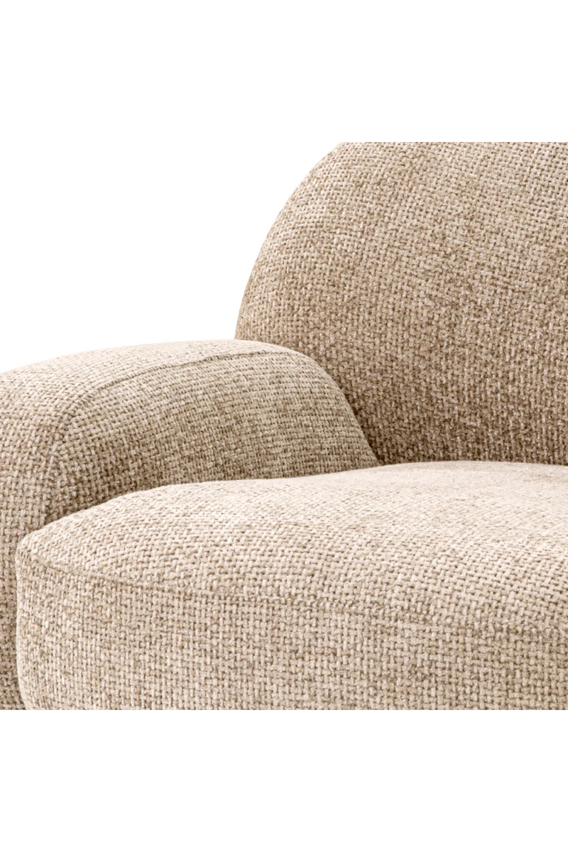 Fauteuil pivotant en Lyssa Sable | Eichholtz Udine | Meubleluxe.fr