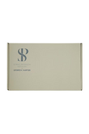 Plaid géométrique en laine et cachemire beige | Andrew Martin Monte | Meubleluxe.fr