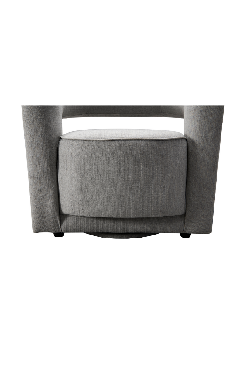 Fauteuil pivotant en tissu gris | Andrew Martin Madison | Meubleluxe.fr