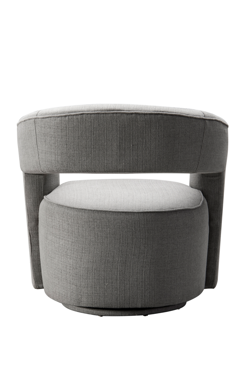 Fauteuil pivotant en tissu gris | Andrew Martin Madison | Meubleluxe.fr