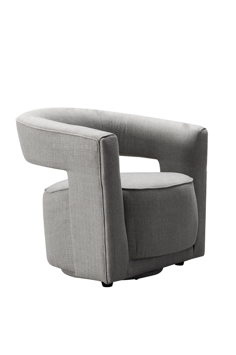 Fauteuil pivotant en tissu gris | Andrew Martin Madison | Meubleluxe.fr