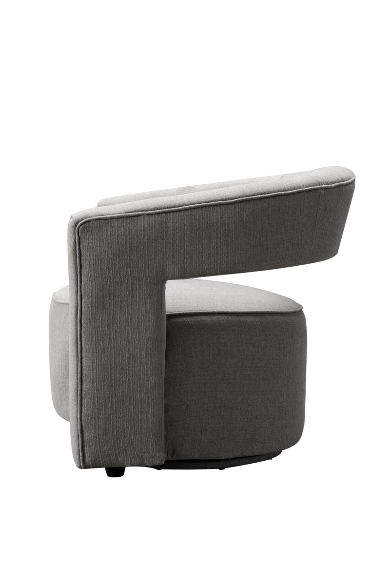 Fauteuil pivotant en tissu gris | Andrew Martin Madison | Meubleluxe.fr