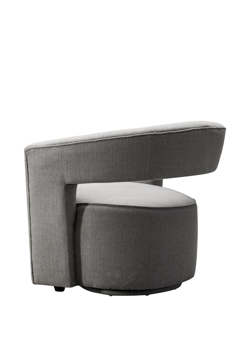 Fauteuil pivotant en tissu gris | Andrew Martin Madison | Meubleluxe.fr