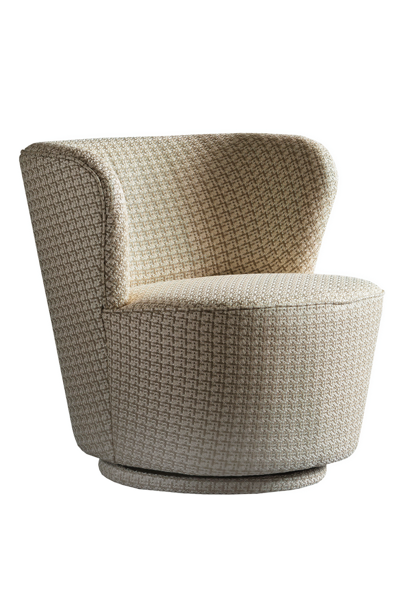 Fauteuil pivotant en tissu beige | Andrew Martin Dorothy | Meubleluxe.fr