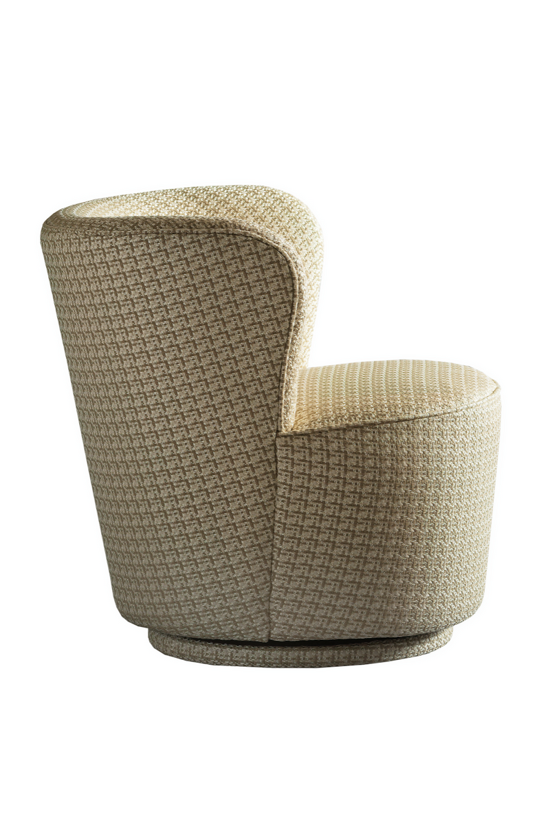 Fauteuil pivotant en tissu beige | Andrew Martin Dorothy | Meubleluxe.fr