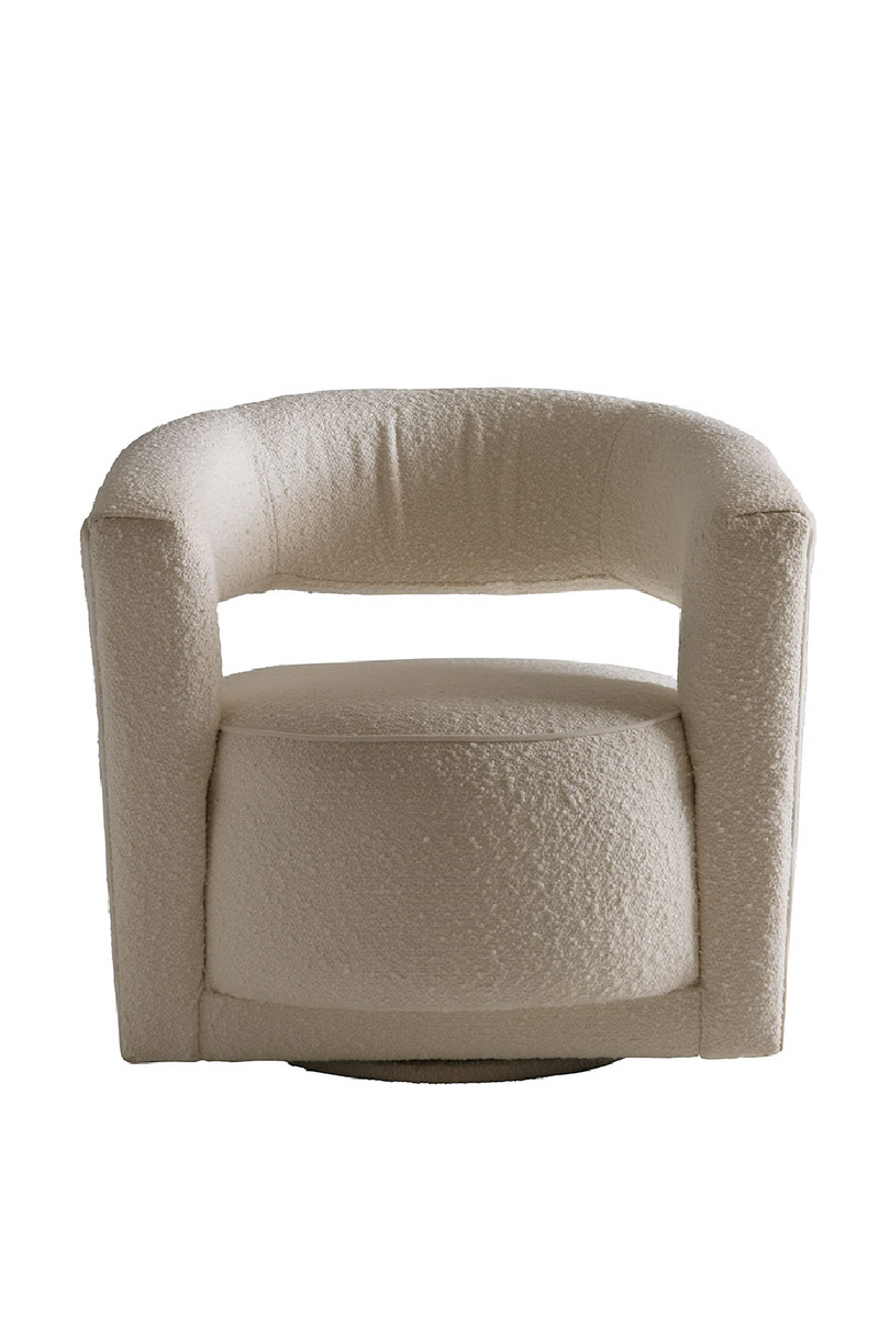 Fauteuil pivotant sculptural bouclé ivoire | Andrew Martin Madison | Meubleluxe.fr