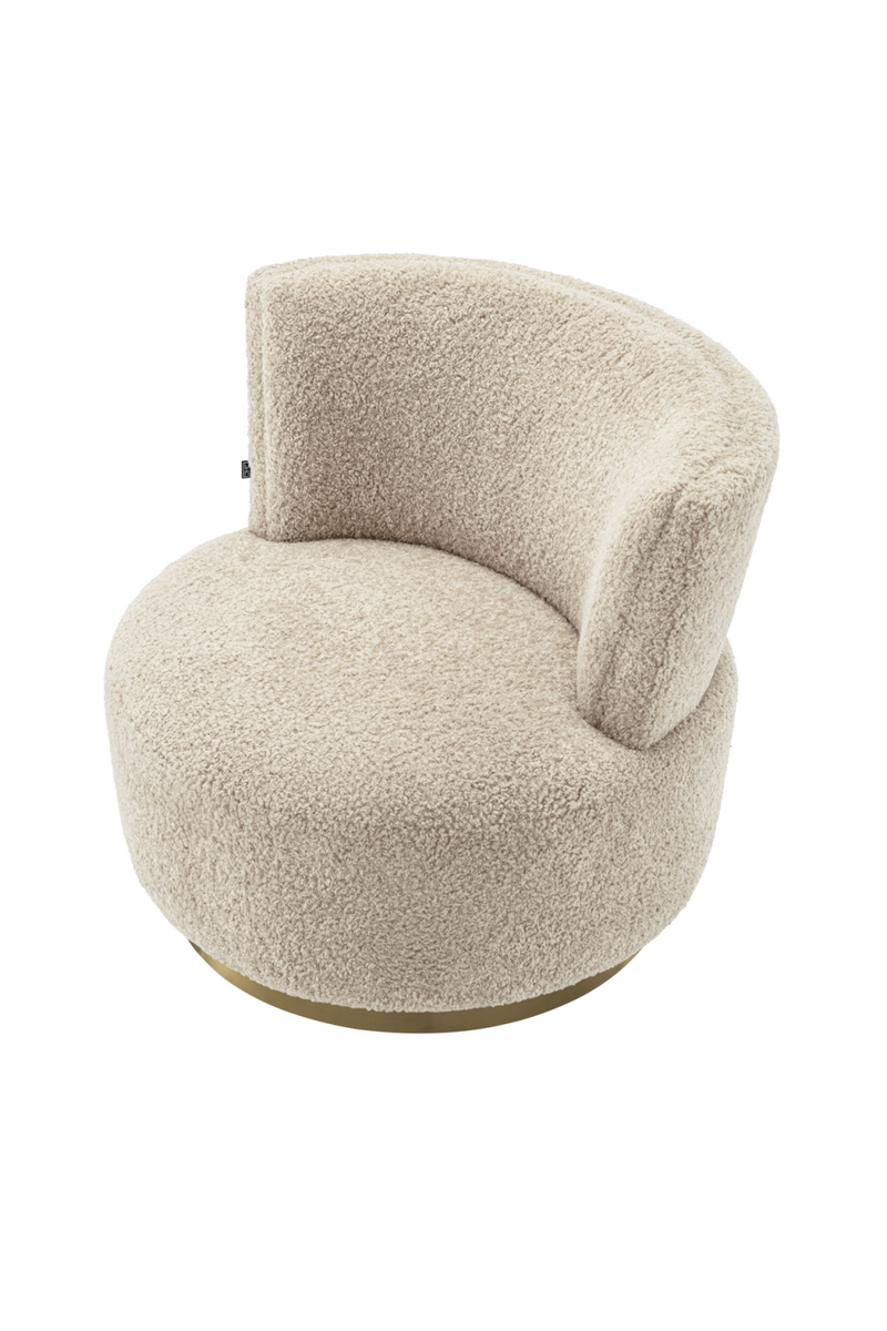 Fauteuil pivotant bouclé beige | Eichholtz Alonso | Meubleluxe.fr