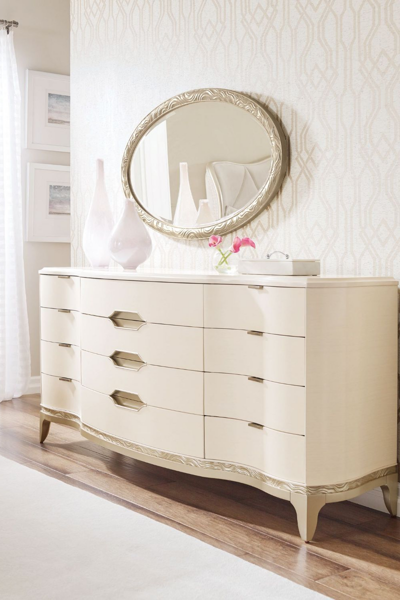 Miroir oval en résine taupe | Caracole Adela | Meubleluxe.fr