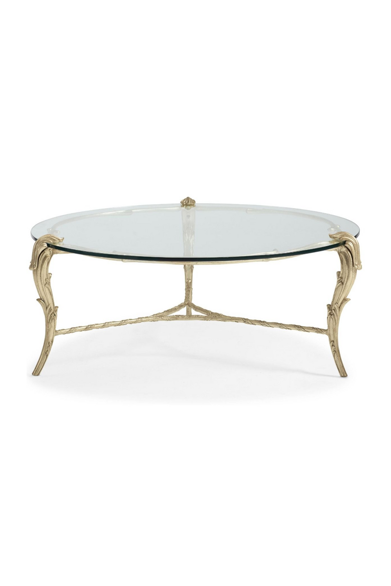 Table basse ronde en verre et feuilles d'acanthe dorées | Caracole Fontainebleau | Meubleluxe.fr